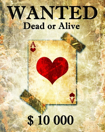 old playing card attached to a wanted paper