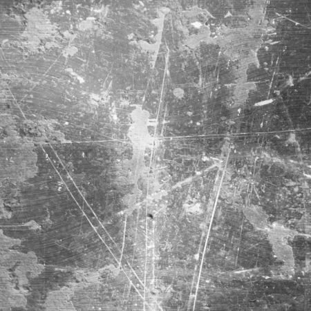 Brushed metal plate with some reflection on itの写真素材