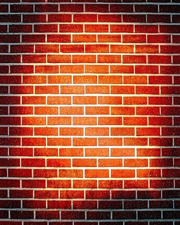 Grunge brick wall with some damage and cracks