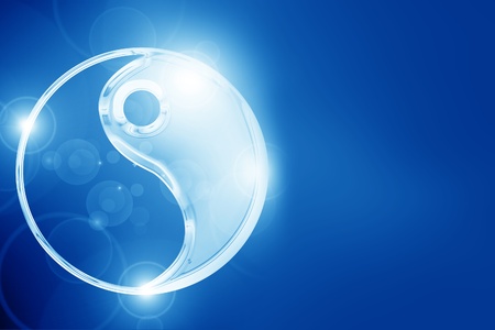 Yin Yang sign on a glowing backgroundの写真素材