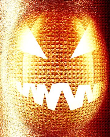 Halloween pumpkin with an intense yellow glowの写真素材
