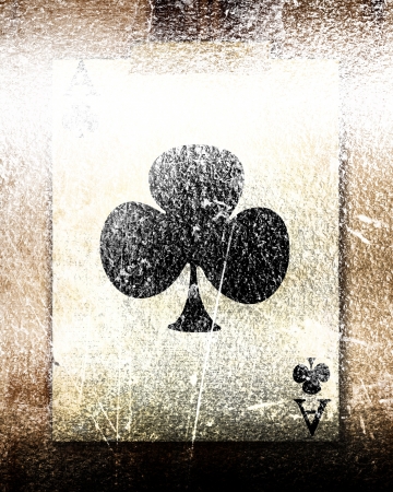 playing card atached to a paper like backgroundの写真素材