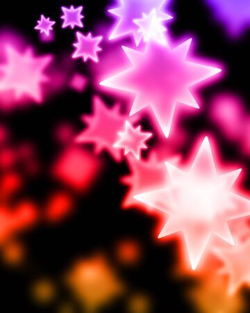 dark background with some colorful stars on itの写真素材