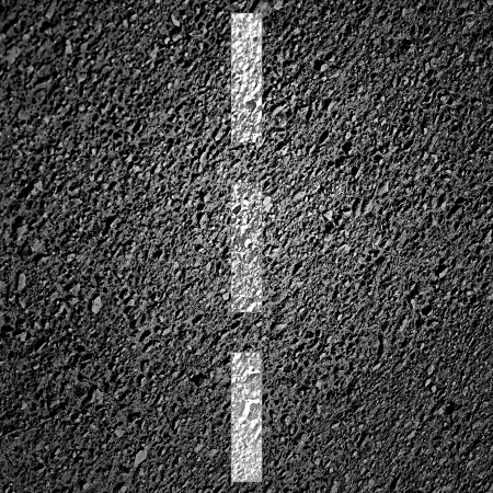 asphalt background texture with some fine grain in itの写真素材