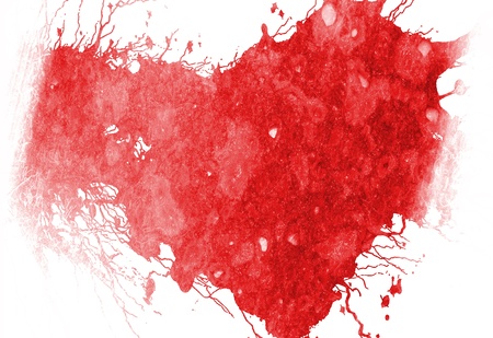 grunge red heart on a solid white backgroundの写真素材