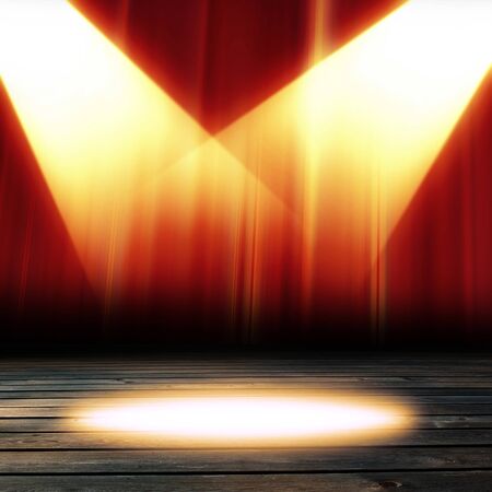 red movie or theater curtains with a spotlight on itの写真素材