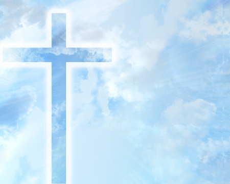 christian cross in a blue sky with some clouds