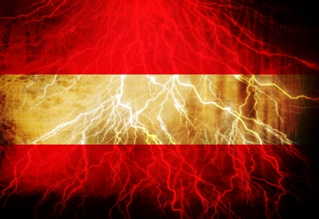 Austrian flag waving in the wind with some spots and stainsの写真素材