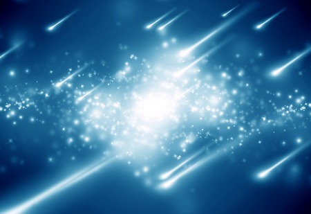 shooting stars in the sky on a blue background