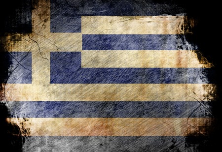 Greek flag waving in the wind with some spots and stainsの写真素材