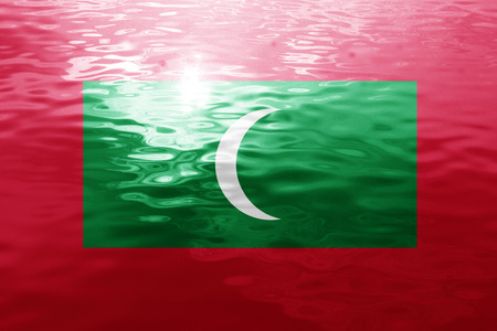 Maldives flag with some soft highlights and foldsの写真素材