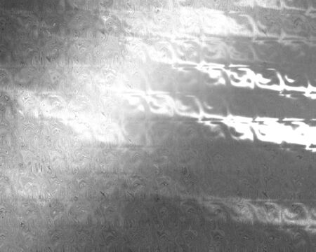 Brushed metal plate with reflected light