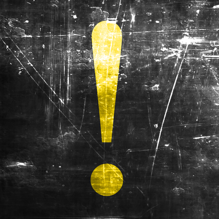 Hazard warning sign with an exclamation markの写真素材