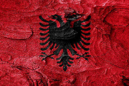 Albania flag with some soft highlights and foldsの写真素材