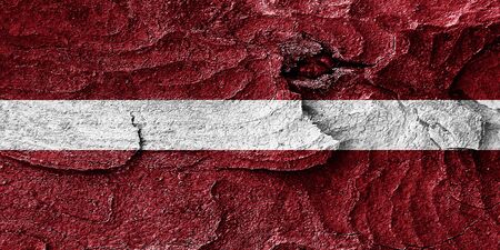 Latvia flag with some soft highlights and foldsの写真素材