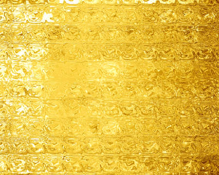 Golden background with some reflected light and highlightsの写真素材