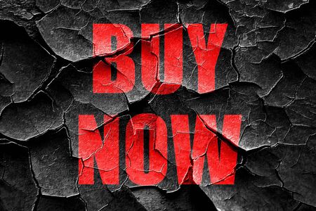 Grunge cracked buy now sign with some smooth linesの写真素材