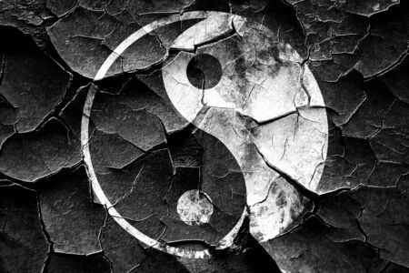 Grunge cracked Ying yang symbol with some soft smooth linesの写真素材