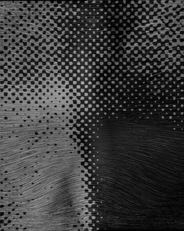 Brushed metal plate with some reflection on itの写真素材