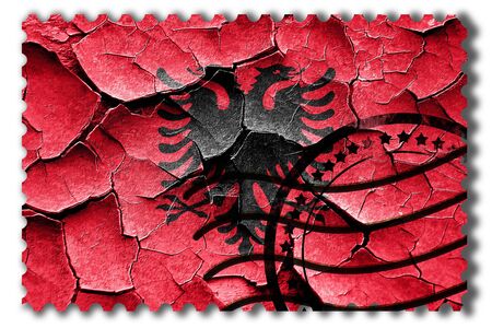 Postal stamp: Grunge Albania flag with some cracks and vintage lookの写真素材