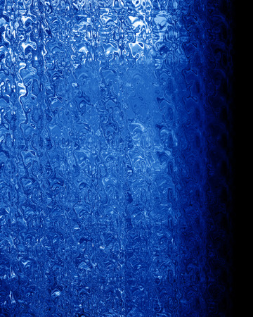 Blue background with some soft shades and highlightsの写真素材