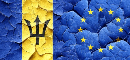 Barbados flag with european union flag on a grunge cracked wallの写真素材
