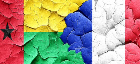 Guinea bissau flag with France flag on a grunge cracked wallの写真素材 ...