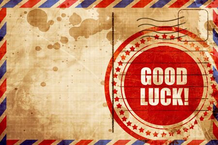 good luck, red grunge stamp on an airmail backgroundの写真素材