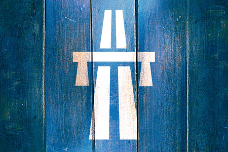 Vintage highway sign on a grunge wooden panelの写真素材