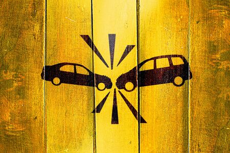 Vintage car crash sign on a grunge wooden panelの写真素材