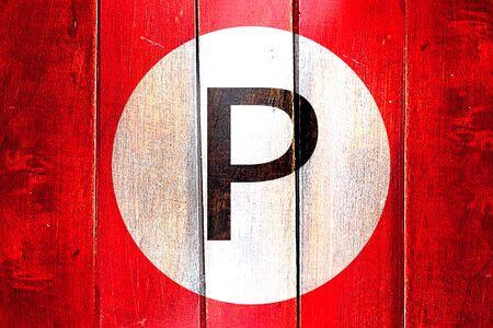 Vintage parking not allowed on a grunge wooden panelの写真素材