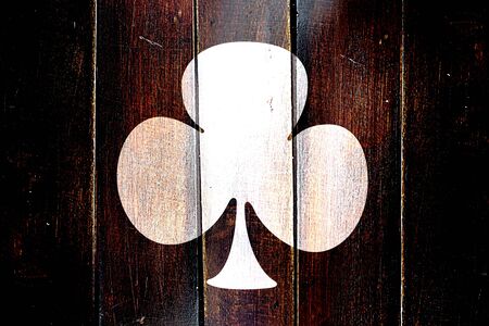 Vintage Spade card background with some soft smooth lines on a grunge wooden panelの写真素材
