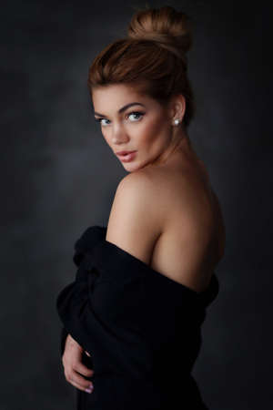 Studio portrait of young beautiful woman