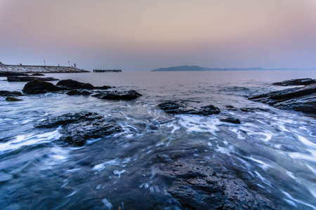 Sea and rock at the sunset  Nature compositionat rayong thailandの写真素材