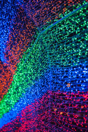 Christmas lights on dark background with colorful  Decorative garland の写真素材