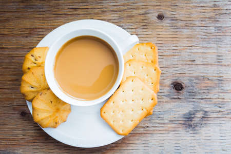 Cup of coffee and cookies  focus on thecoffee の写真素材