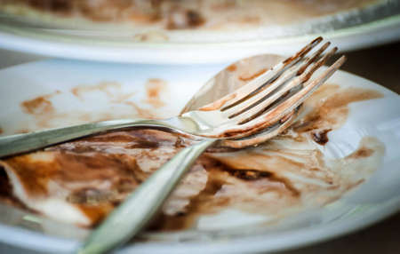 Empty dish after food on the tableの写真素材