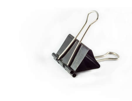 Black Paper clip on white backgroundの写真素材