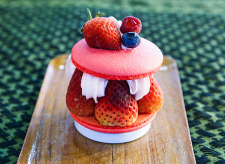 Strawberry Macaroons with fresh strawberries.の写真素材