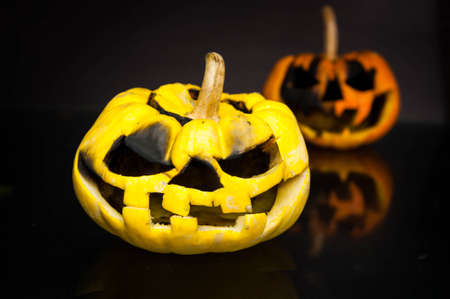 Halloween pumpkin head jack lantern with scary evil faces spooky holidayの写真素材