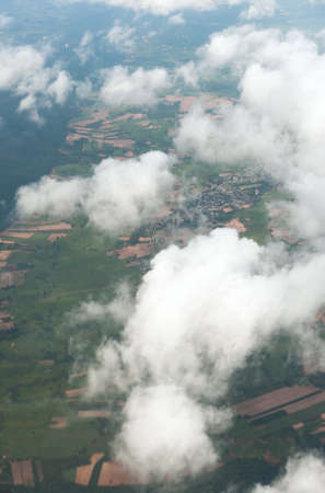Looking through window aircraft during flight in wing with a nice blue skyの写真素材