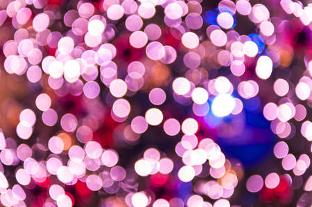 Pink glittering lights. Blurred abstract backgroundの写真素材
