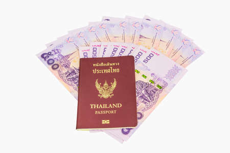 Thailand passport and Thai money. Concept of traveling.の写真素材