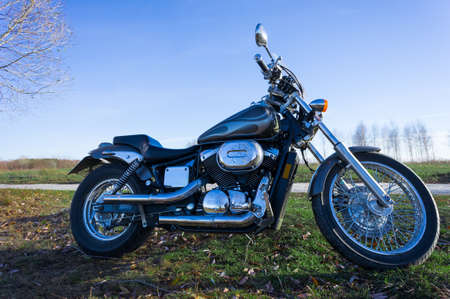 Motorbike on a landscapeの写真素材