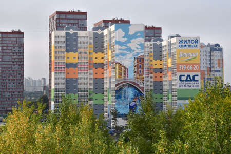 Novosibirsk, Siberia, Russia - 08.05.2019: New high residential buildings. Colorful painted facades...