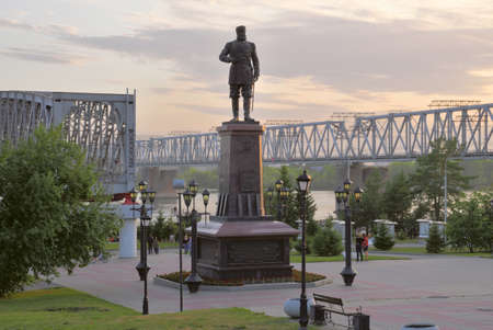 Novosibirsk, Siberia, Russia - 08.05.2019: Monument to Alexander III in Novosibirsk. Monument to the Russian Emperor Alexander III. Span of the first railway bridge over the river Ob, Park City Beginning. Evening lightのeditorial素材