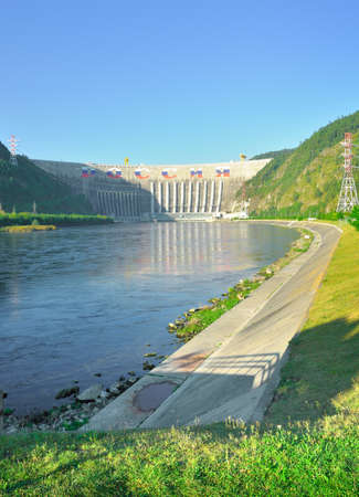 The dam of the largest hydroelectric power station on the mountain banks of the Yenisei River. Siberia, Russiaの写真素材