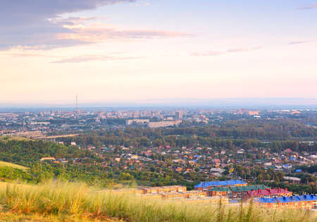 Pink dawn over the city. Khakassia, Siberia, Russiaの写真素材