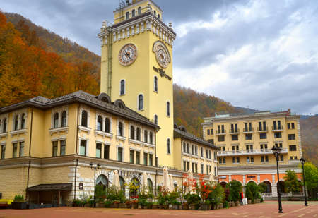 Rosa Khutor, Sochi, Russia, 11.01.2021. The village Rosa Khutor. Town Hall with clock on Rose Square...
