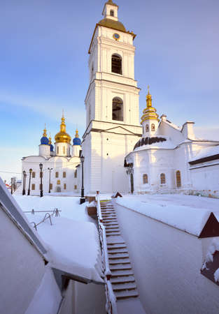 Tobolsk Kremlin in winter. The white stone wall of the high bell tower, the staircase of the vzvoz. Old Russian architecture of the XVII century in the first capital of Siberia. Russia, 2021の写真素材